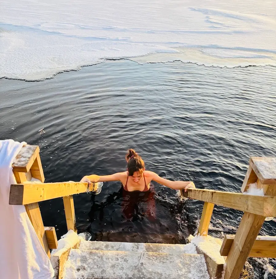 9 Winter Adventures in Lapland You Will Love - Around Europe Dip In a Frozen Lake In Lapland